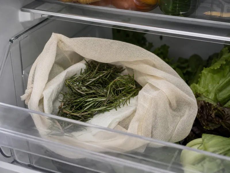 Rosemary sprigs loosely wrapped for refrigerator storage | EpicureDelight
