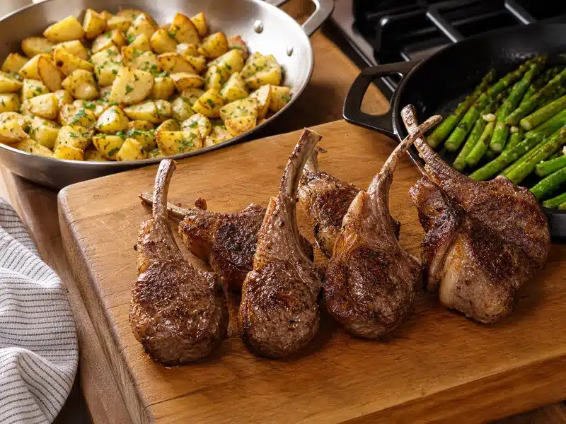 Rested lamb chops with potatoes and asparagus ready to serve | EpicureDelight