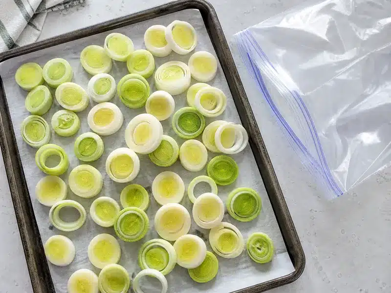 Sliced leek rounds prepared for freezer storage | EpicureDelight